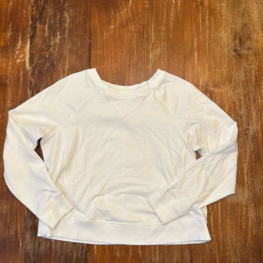 Lululemon, 8, cotton sweatshirt.
Four-way stretch. Very comfortable.